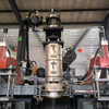 70 Screw, Fully Automatic Servo Hydraulic Blow Molding Machine, 2 Stations, 1 Chamber, Maximum Capacity for Producing 5L Bottles.